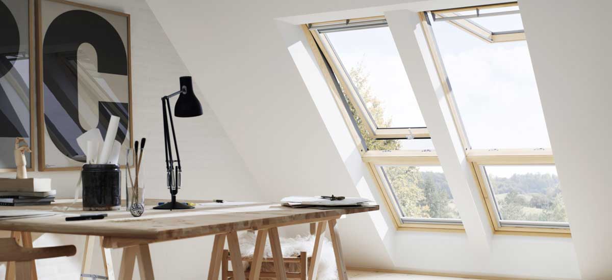 VELUX top hung roof windows in lacquered pine